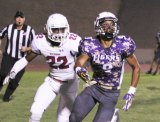 Lemoore High School's Allen Perryman, in action for his Tigers' football team. Perryman recently joined the College of the Sequoias football coaching staff.